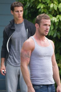 Blatz (rear) and Gigandet as blue-collar brothers.