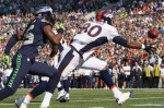 Denver's Julius Thomas is unable to catch the ball in the end zone as Seattle's Richard Sherman gives chase.