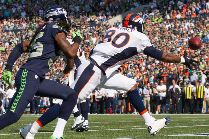 Denver's Julius Thomas is unable to catch the ball in the end zone as Seattle's Richard Sherman gives chase.