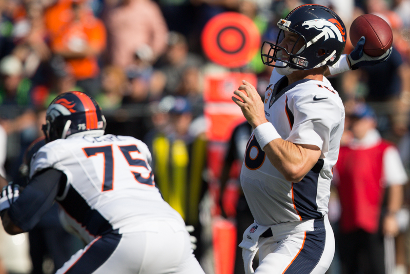 Broncos QB Peyton Manning throws a pass in the second quarter.