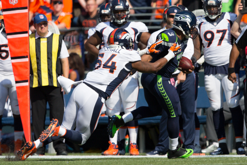 Seahawks quarterback Russell Wilson scrambles for a gain.