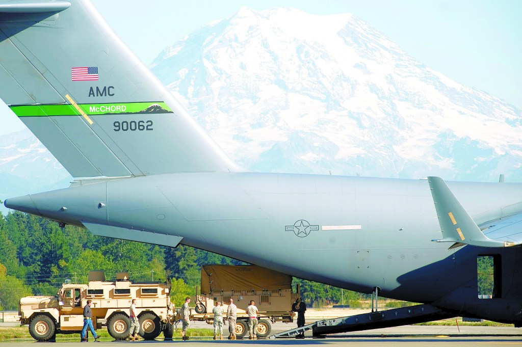 Life during wartime: A C-17 is loaded at JBLM in 2011.