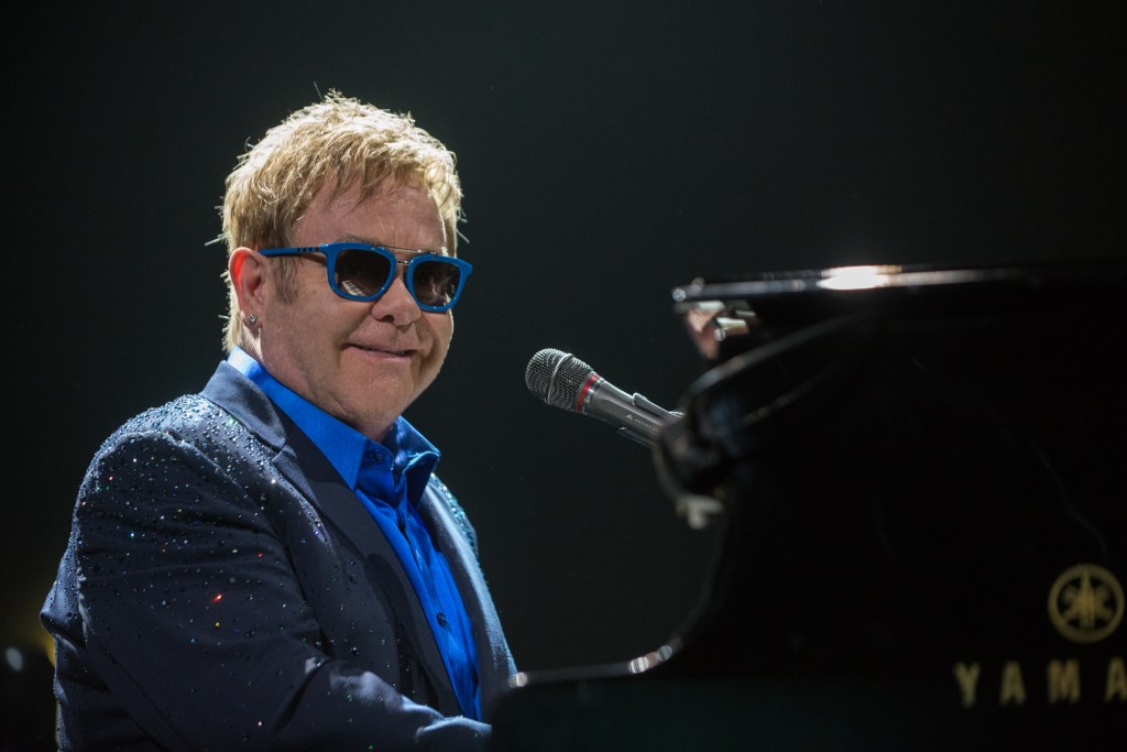 Elton John was as classy as ever stopping after each song to happily engage the fans and throw a smile.