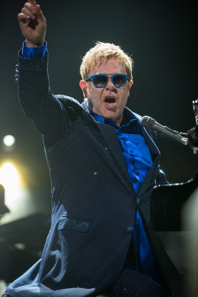 Elton John was as classy as ever stopping after each song to happily engage the fans and throw a smile.