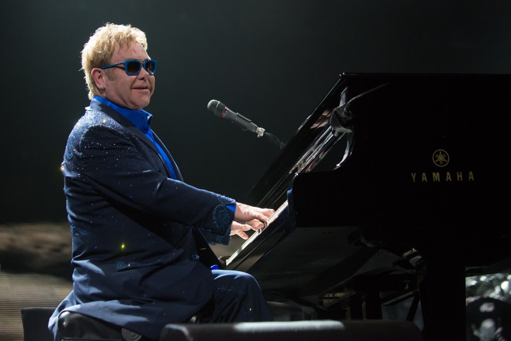 Elton John was as classy as ever stopping after each song to happily engage the fans and throw a smile.