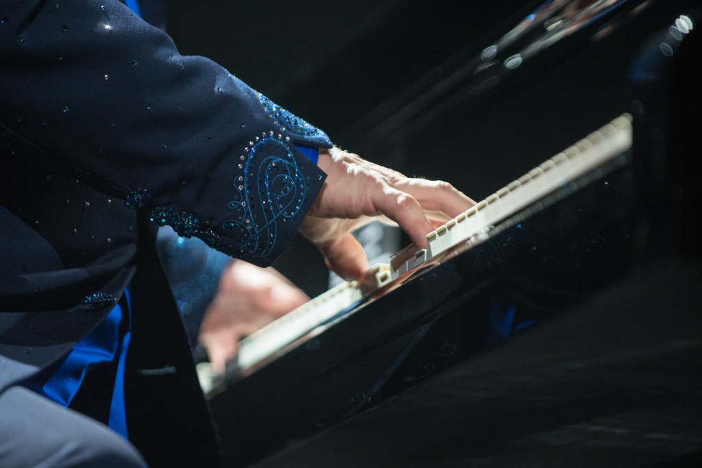 Elton John was as classy as ever stopping after each song to happily engage the fans and throw a smile.