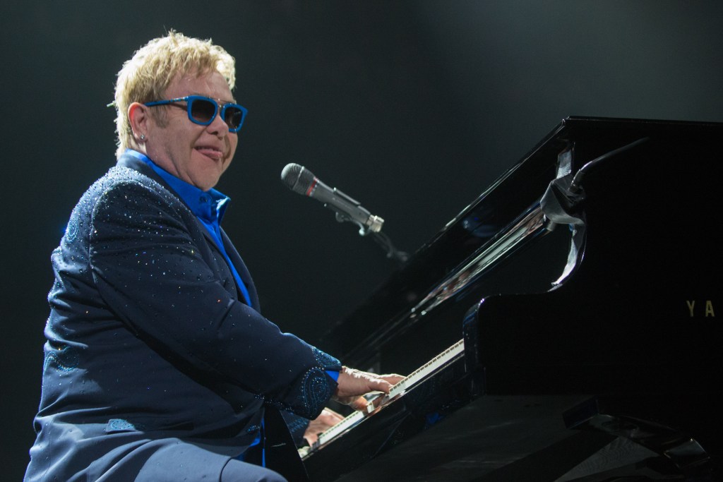 Elton John was as classy as ever stopping after each song to happily engage the fans and throw a smile.