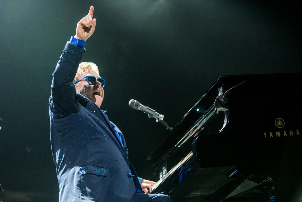 Elton John was as classy as ever stopping after each song to happily engage the fans and throw a smile.
