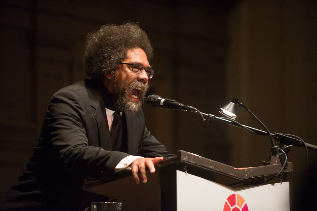 Dr. Cornel West sermonizing to the absolutely packed house at Town Hall Seattle.  Photo by Morgen Schuler