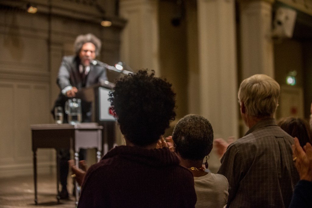 Dr. Cornel West sermonizing to the absolutely packed house at Town Hall Seattle.  Photo by Morgen Schuler