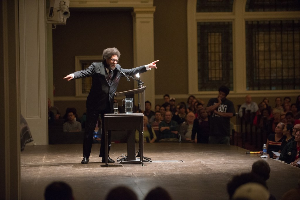 Dr. Cornel West sermonizing to the absolutely packed house at Town Hall Seattle.  Photo by Morgen Schuler