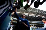 Seattle starting receiver Doug Baldwin signs autographs before facing off against the Dallas Cowboys at home in Seattle, WA.