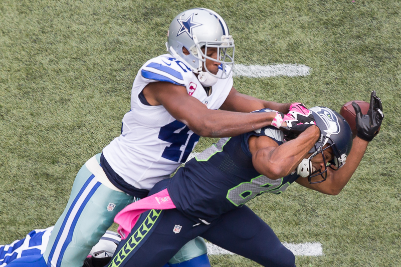 Dallas safety Barry Church breaks up a pass to Doug Baldwin on a third and eleven for Seattle.