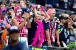 Seattle fans cheer on the Hawks' defense in the fourth quarter.