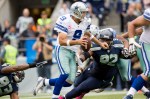 Dallas QB Tony Romo scrambles in the fourth quarter.