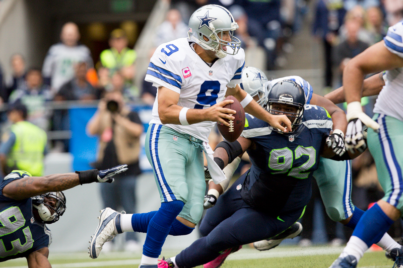Dallas QB Tony Romo scrambles in the fourth quarter.