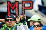 Two Seahawks fangs hold up the letters M and P, in support of the victims and survivors of the recent school shooting at the Marysville-Pilchuck High School.