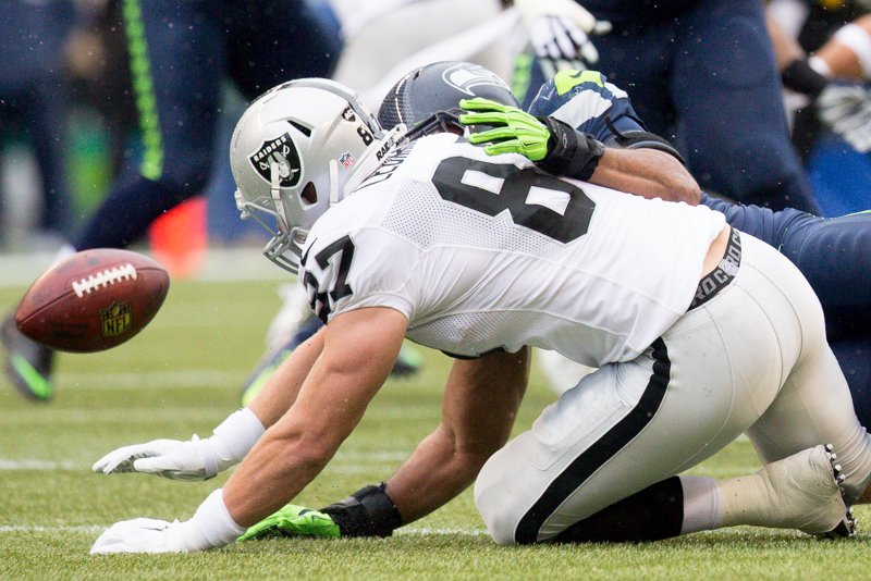 Oakland tight-end Brian Leonhardt reaches for an underthrown pass in the first quarter.