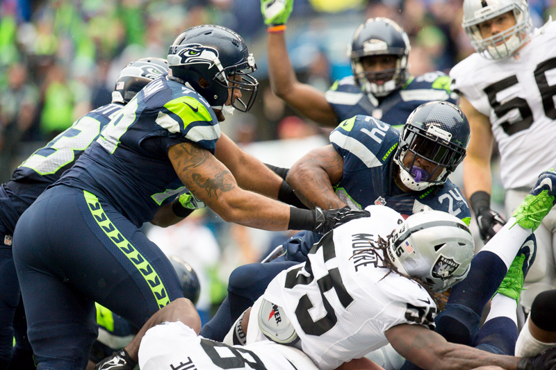 Seattle's Marshawn Lynch is pushed into the end-zone for six points in the first quarter.