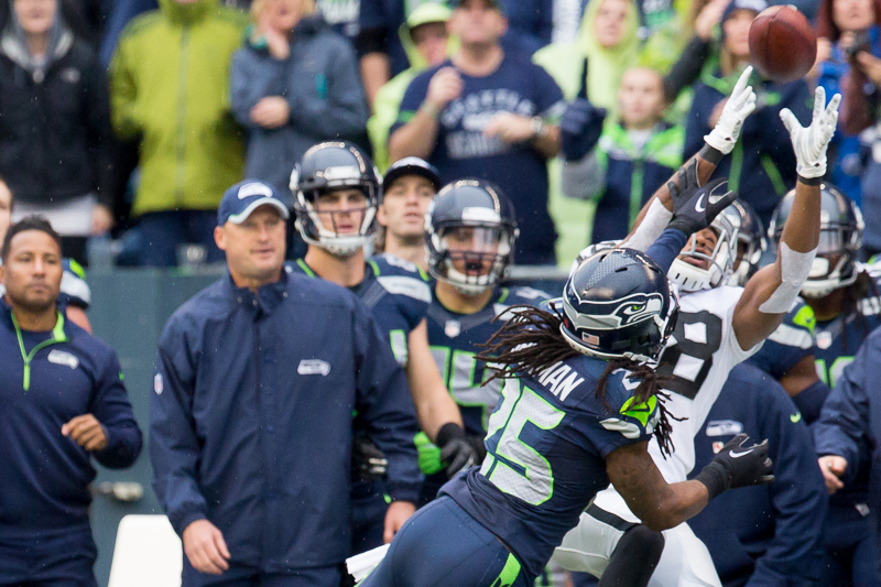 Seattle cornerback Richard Sherman breaks up a deep pass intended for Raiders wide-reciever Andre Holmes in the first quarter.