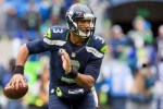Russell Wilson scrambles for a short gain in the first quarter.
