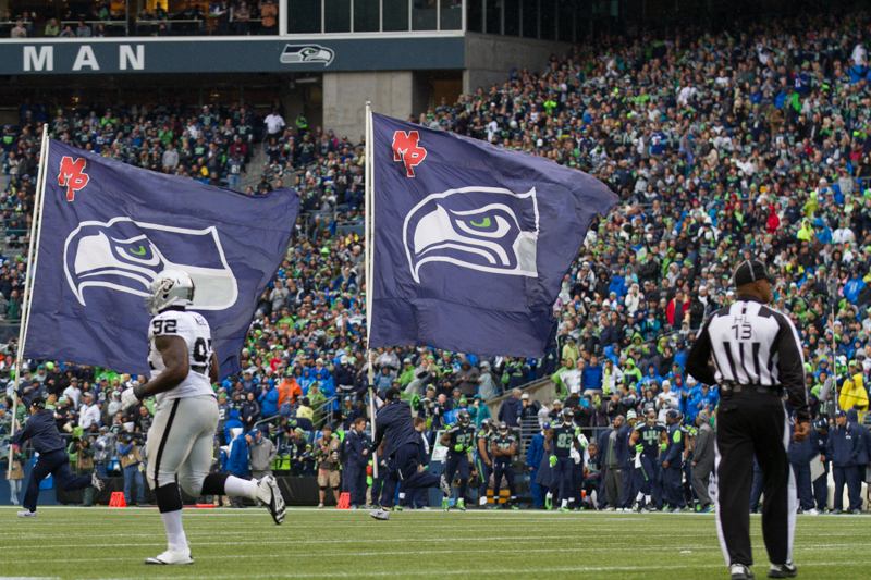 Fans celebrate a 34 yard field goal by Hawk's kicker Steven Hauschka in the second quarter.