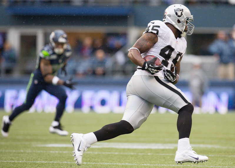 Oakland fullbuck Marcel Reece gains 12 on a short pass in the second quarter.