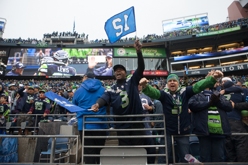 Seattle fans celebrate Lynch's second touchdown, which put the team up 24-3 into the half.