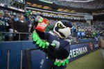 Seahawks' mascot Blitz holds up a bag of Skittles after running back Marshawn Lynch, who shares his nickname with the candy, scores a touchdown in the second quarter.