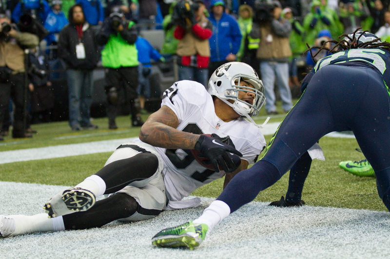 Raider receiver Mychal Rivera turns to look at the call of the referee after catching a 1 yard touchdown pass in the third quarter.