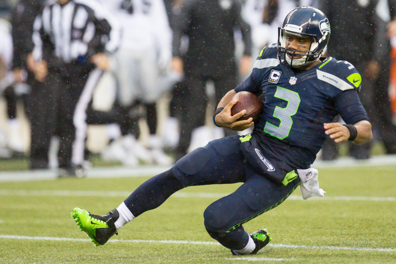 Russell wilsons scrambles for a 19 yard gain in the fourth quarter.