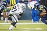 Raider running back Maurice Jones-Drew prepares for a hit by Seattle's Earl Thomas in the fourth quarter.