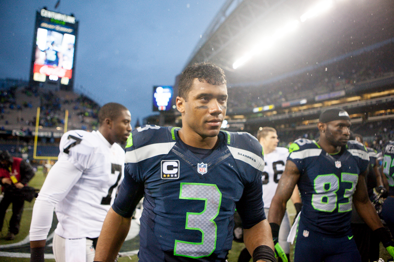 Seahawk's quarterback Russell Wilson exits for the locker room after beating the Oakland Raiders 30-24 in Seattle.