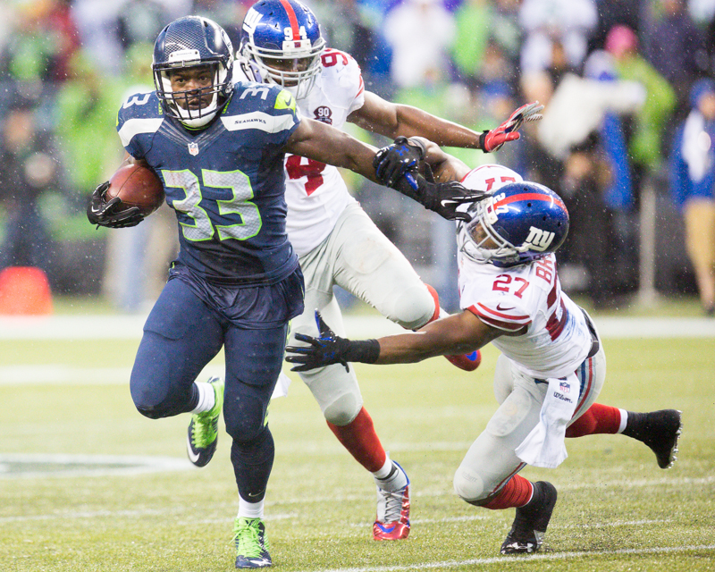 Seattle running back Christine Michael runs upfield for a 45-yard gain in the fourth quarter.
