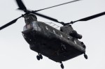 A Chinook helicopter overflies Century Link Stadium before the game on Sunday.