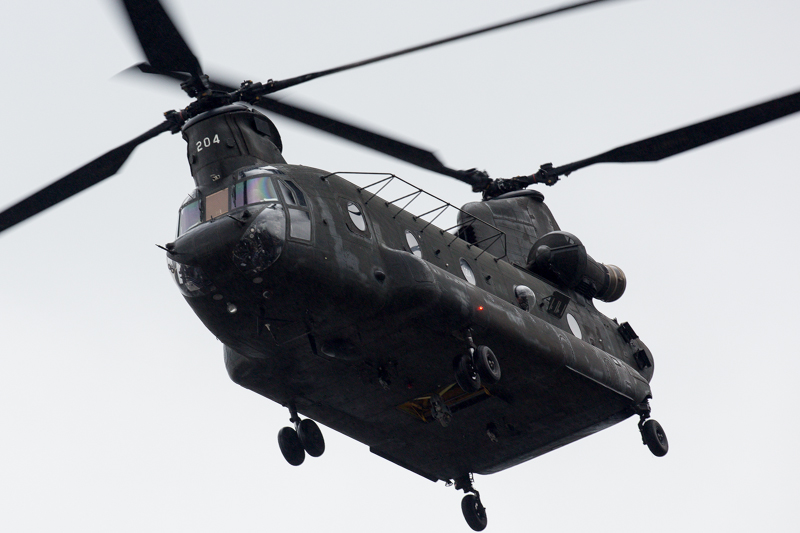 A Chinook helicopter overflies Century Link Stadium before the game on Sunday.
