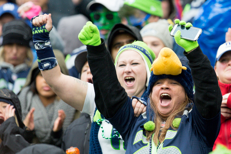 Seahawks fans cheer as a Giants deep pass for 21 yards is reversed after a Seattle challenge.