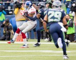 Giants receiver Rueben Randle completes a five-yard pass in the first quarter.