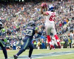 Giants receiver Preston Parker catches a six-yard pass for a touchdown in the first quarter.