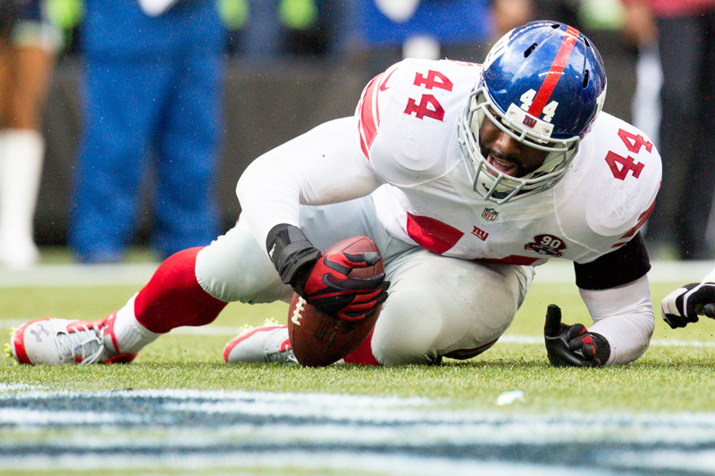 Giants running back Andrea Williams rolls into the end-zone on a three-yard run in the second quarter.