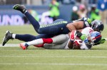 Giants receiver Rueben Randle is downed for 3 yards by Seattle linebacker KH Wright in the second quarter.