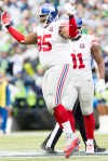 Giants defensive tackle Johnathan Hankins celebrates stopping Seattle on a second and goal in the second quarter.