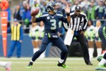 Russell Wilson throws a seven yard pass to receiver Doug Baldwin in the second quarter.