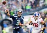 Russell Wilson throws a pass in the third quarter.