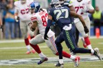 Seattle defenders chase down Giants receiver Preston Parker in the second quarter.