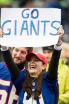 A Giants fan holds up a sign in support of her team in the second quarter.
