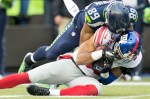 Giants safety Quintin Demps intercepts a pass intended for Seattle's Doug Baldwin in the third quarter.