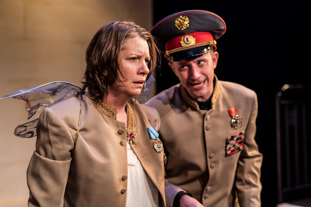 Daleka (Jerger) meets the general (Neel).Truman Buffet