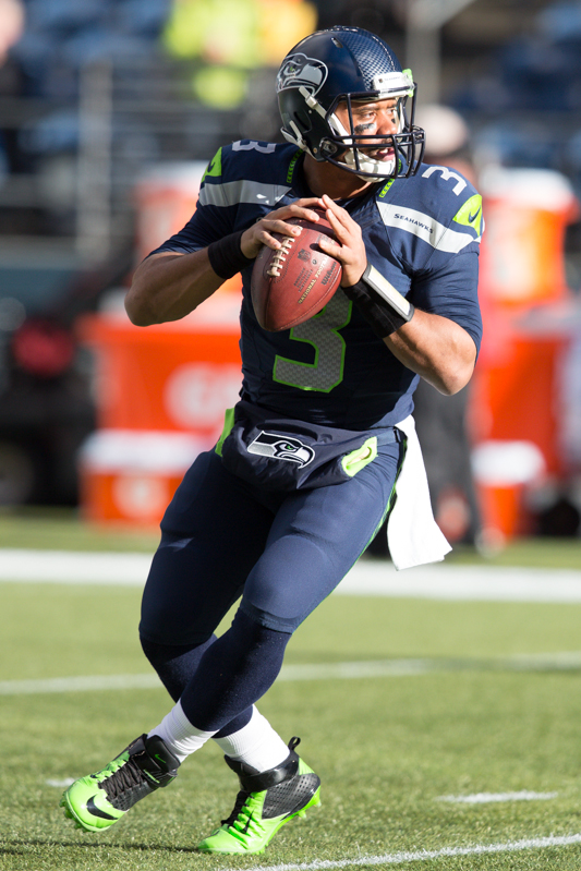 Seattle quarterback Russell Wilson warms up before the game.