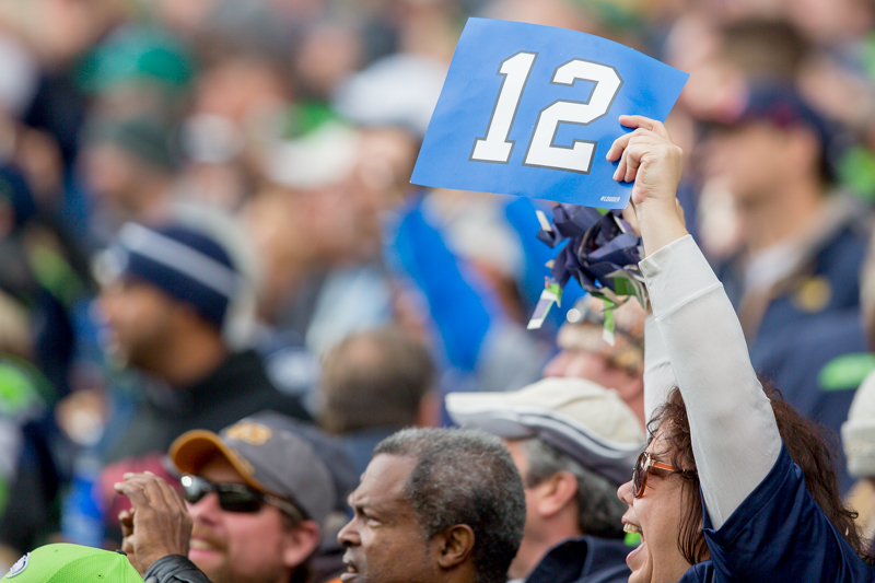 Fans cheer before the game.